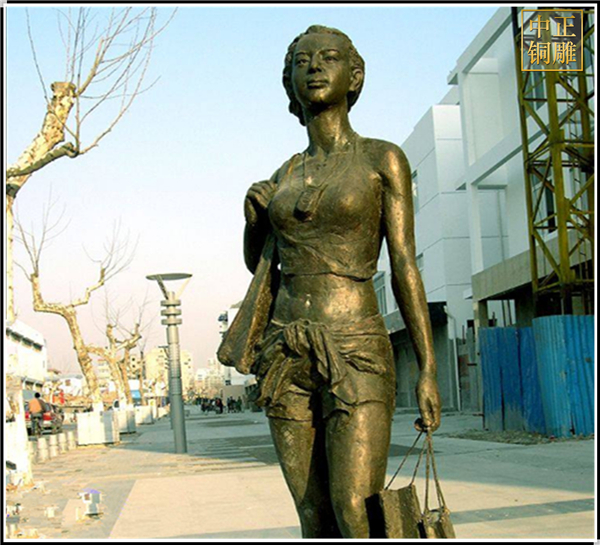 步行街商場(chǎng)購(gòu)物女孩人物銅像